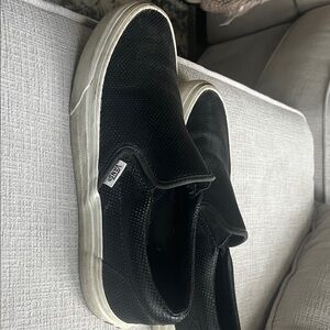 Vans women’s Black Textured Slip-On Sneakers